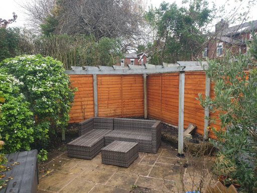 garden corner refurb fence panel replacement and flag regrouting